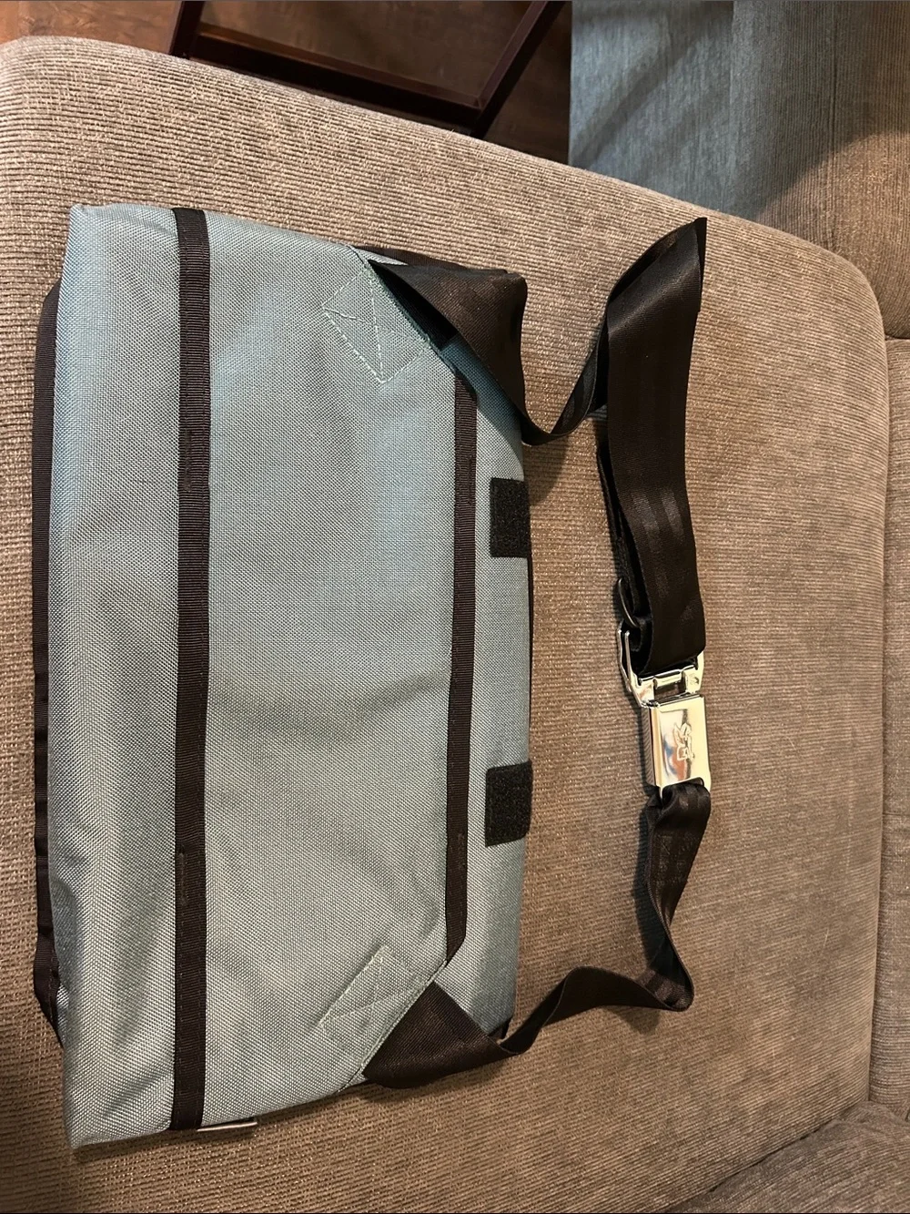 Light Blue Messenger Bag with Black Trim and Adjustable Strap